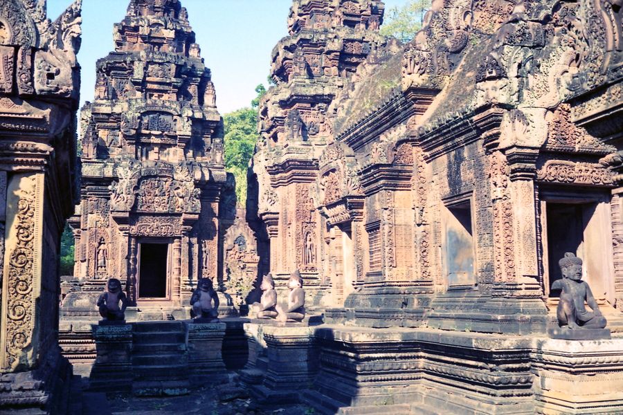 Deeply cut pink sandstone carving on a doorway at Banteay Srei temple
