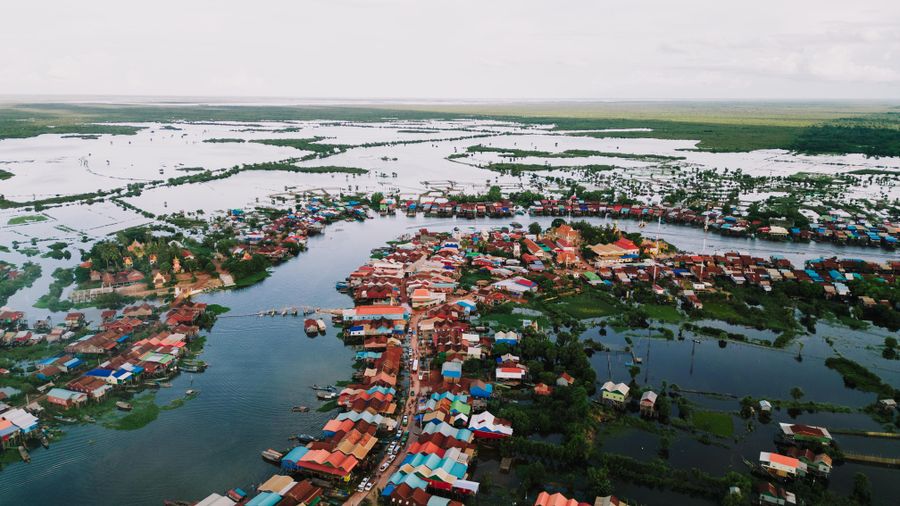 Stilt houses standing high above the water at Kampong Khleang on the Tonlé Sap, seen from the air